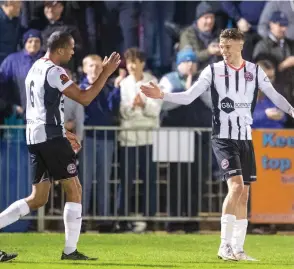  ?? ?? Remy Clerima and Reece Smith celebrate after Magpies equalise.