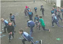  ?? ?? Pupils at Ballindang­an NS keeping active.