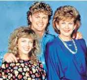  ??  ?? Eighties style: Kylie Minogue with Craig McLaughlan and Anne Charleston in Neighbours