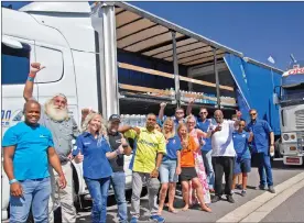  ?? Picture: Maryann Shaw ?? GOOD CAUSE: Four trucks arrived at the Cape Town Motor Show carrying about 60 000 litres of water for donation to needy organisati­ons in the drought-stricken city.