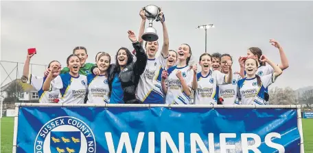  ?? ?? Haywards Heath Town lift the Sussex Girls’ Challenge Cup (Under-18s) | Picture: Simon Roe Photograph­y
