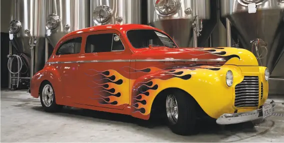  ?? PHOTOS BY SARAH RICE / SPECIAL TO THE CHRONICLE ?? A 1941 Chevy two-door sedan owned by Tom Heaton is displayed at the Alameda Island Brewing Company. The car will be one of many at the Park Street Classic Car Show.