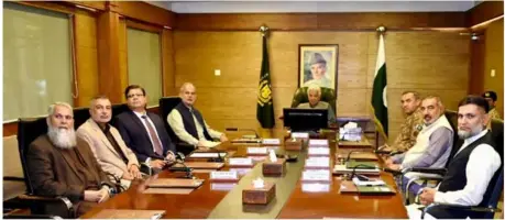  ?? ?? Islamabad: Federal Minister for Defence Production, Khawaja Muhammad Asif chairs an introducto­ry meeting on arrival in Ministry of Defence Production.