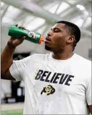  ?? UNIVERSITY OF COLORADO ATHLETICS ?? Colorado offensive lineman Justin Mayers takes a drink during a workout in Boulder, Colo., on Jan. 18, 2024.