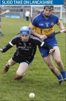  ??  ?? Kevin Banks of Sligo in action with Lancashire’s David Power in Markievicz Park during their Allianz Hurling League round 4 clash. The match ended 3-15 to 2-9 in favour of Lancashire. Sligo are away to Fermanagh on Sunday in Brewster Park at 2:30pm.