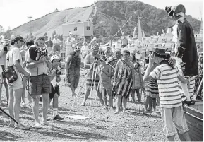  ??  ?? A man dressed as Cook takes part in a pageant in Picton in 1970.