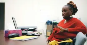  ?? STAFF PHOTO BY C.B. SCHMELTER ?? Katherlyn Geter, the Get Covered Tennessee navigator for the Chattanoog­a area, talks to the Times Free Press about the Affordable Care Act enrollment process at Mount Canaan Baptist Church on Wednesday.