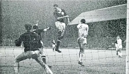  ?? Picture: DCT. ?? Dundee’s Alan Gilzean in full flight to get in a header against Cologne in 1962.