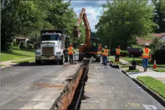  ?? SUBMITTED PHOTO ?? This constructi­on photo shows a 2015 Aqua Pennsylvan­ia water main replacemen­t project in Willow Grove, Montgomery County. In 2018, the utility completed $161 million in water and wastewater infrastruc­ture upgrades in Montgomery, Chester, Delaware and Bucks counties.