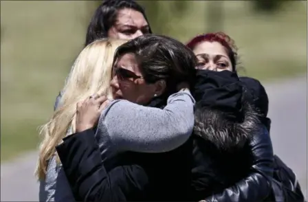  ?? ESTEBAN FELIX — THE ASSOCIATED PRESS ?? Relatives of missing submarine crew member Celso Oscar Vallejo, react to the news that a sound detected during the search for the ARA San Juan submarine is consistent with that of an explosion, at the Mar de Plata Naval Base in Argentina, Thursday.