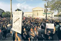  ?? ALEX BRANDON/ASSOCIATED PRESS FILE PHOTO ?? Demonstrat­ors gather in May outside the U.S. Supreme Court following a report by Politico of a draft opinion suggesting the justices could be poised to overturn Roe v. Wade. The court has since been silent about the inquiry into the leak.