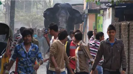  ?? THE ASSOCIATED PRESS PHOTOS ?? A female elephant wandered from the Baikunthap­ur forest into the town of Siliguri in West Bengal state on Wednesday, probably in search of food.