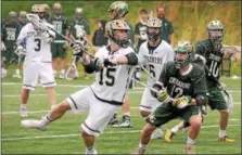  ?? GENE WALSH — DIGITAL FIRST MEDIA ?? La Salle’s Grant Pinto turns to shoot near Lansdale Catholic’s Daniel White during their PCL semifinal Wednesday.