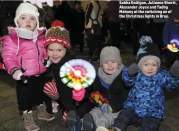  ??  ?? Sabha Galligan, Julianne Shortt, Alexander Joyce and Tadhg Mahony at the switching on of the Christmas lights in Bray.