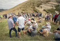  ??  ?? The crowd gathers for the opening ceremony at Cape Farewell.