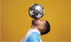  ??  ?? Manchester City’s Riyad Mahrez kisses a football. ‘For him, playing is not a job – it’s a pleasure,’ says a former coach. Photograph: Michael Regan/Uefa/Getty Images