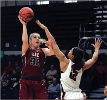  ?? LEE ATHLETICS ?? Lee’s Carrie Cheeks (32) goes up for a shot over a Union player during the GSC semifinal matchup on Saturday.