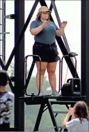  ?? Jeremy stewart ?? Cedartown High School marching band drum major Lily Jackson leads the group through practice at band camp in July.