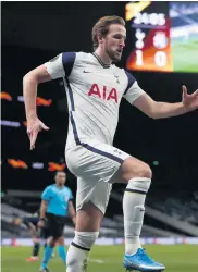  ??  ?? At the double: Tottenham’s Harry Kane celebrates the first of his two goals against Dinamo Zagreb