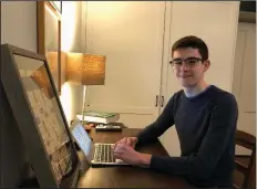  ?? (Arkansas Democrat-Gazette/Sean Clancy) ?? Simon Marotte, 16, works on constructi­ng a crossword puzzle at his home in Conway. Marotte has had three crossword puzzles accepted by The New York Times. The first is set to run March 9.