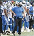  ?? PHELAN M. EBENHACK — THE ASSOCIATED PRESS ?? Detroit Lions offensive coordinato­r Darrell Bevell, center, watches from the sideline during the second half of a Oct. 18 game against the Jacksonvil­le Jaguars in Jacksonvil­le, Fla.