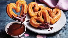 ??  ?? MEAT-FREE TREATS: M&S plant churros and, top, its no-beef pie
