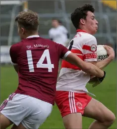  ??  ?? Páuric Hughes of Kilanerin is tackled by Jack O’Connor.