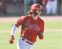  ?? Steven M. Falk / TNS / Philadelph­ia Inquirer ?? The Phillies’ Mickey Moniak rounds the bases after a solo homer against the Yankees on Thursday.