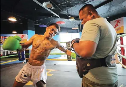  ?? HONG MENEA ?? Kun Khmer fighter Chan Na during a workout at the HAHA Super Fight Club & Gym in Olympia Mall on January 16.