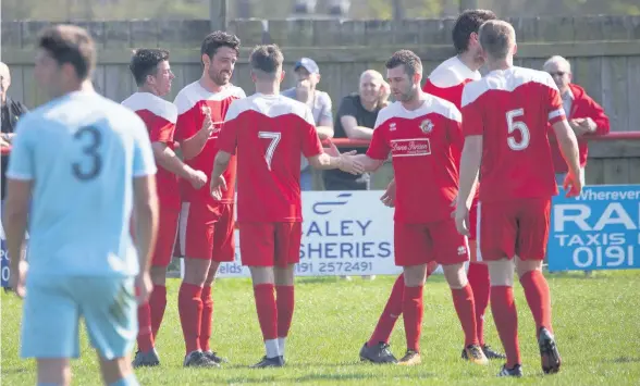  ?? ADAM BARNSLEY ?? North Shields players celebrate after Paul Robinson gave them the lead against Marske United yesterday