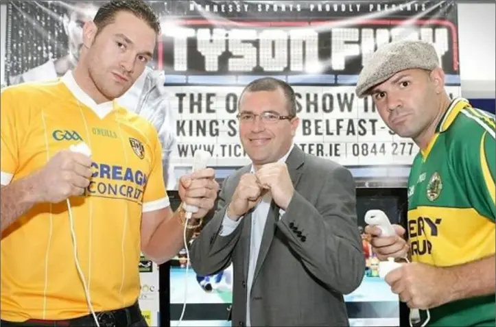  ??  ?? Tyson Fury has always been proud of his Irish heritage and he is pictured wearing an Antrim jersey in the build-up to one of his fights in Belfast.