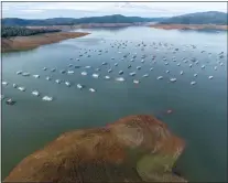  ?? ANDREW INNERARITY — CALIFORNIA DEPARTMENT OF WATER RESOURCES ?? The water level at California's second-largest reservoir, Lake Oroville in Butte County on Jan. 12, has risen dramatical­ly due to a series of large storms. The lake level rose 130feet between Dec. 26and Jan. 26, increasing from 29% full to 63% full in one month.