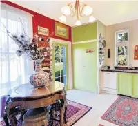  ?? PHOTO: WAYNE MAGEE ?? Grooved cupboards feature in the farmstyle kitchen.