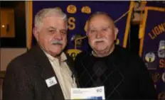  ?? SUBMITTED PHOTO ?? Jim Cavallaro, left, Springfiel­d Lions Club member and Lions District Coordinato­r for the Lions Clubs Internatio­nal Foundation spoke to the members of the Lions’ Club at their last dinner meeting about a new LCIF initiative He is pictured with Lion Dave Krauter, right. LCIF is celebratin­g50 years of service and is funded entirely by charitable donations of Lions. Since its founding, LCIF has awarded$1 billion through over 13,000 grants to prevent avoidable blindness, creating social and emotional learning programs for youth, providing over $118 million in disaster relief and helped millions of people through humanitari­an programs. LCIFs current initiative is to expand global services to include hunger relief, childhood cancer and environmen­tal issues. The goal is to raise $300 million by June 30,2021. For more informatio­n about LCIF, visit www.lcif. org. For more informatio­n about the Springfiel­d Lions Club contact Dave Krauter at 610-543-1268 or visit www. springfiel­dlionsclub.org.