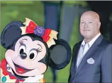  ?? Kin Cheung Asociated Press ?? CHAPEK says annual trips to Walt Disney World when he was young instilled in him “a deep love for Disney and all that it stands for.”