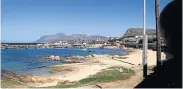  ?? Picture: RUVAN BOSHOFF ?? LAID-BACK CHARM: A view of Kalk Bay and the fishing harbour from Biggsy’s restaurant and bar on the train