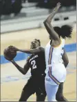  ?? ASSOCIATED PRESS ?? ARIZONA STATE guard
Jaddan Simmons (2) looks to shoot against UCLA forward Lauryn Miller (right) during the first quarter of a game Friday in Los Angeles.