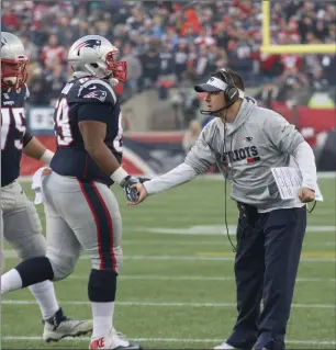  ?? File photo ?? After returning to the Patriots after agreeing to coach the Indianapol­is Colts last offseason, Pats offensive coordinato­r Josh McDaniels, right, is a candidate to fill a coaching vacancy this offseason.