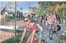  ?? RP-FOTO: MVO ?? Rauf aufs Fahrrad und los geht’s: So präsentier­t sich der Kreis Kleve in Düsseldorf.