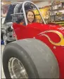  ?? Sally Carroll/Special to The Weekly Vista ?? Deni Jensen shows off the dragster she races. The married mom of two carves out the time for racing, despite a busy schedule of work and family.