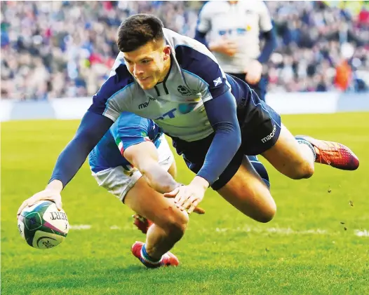  ?? PICTURES: Getty Images ?? Irrepressi­ble: Blair Kinghorn dives over for his second try