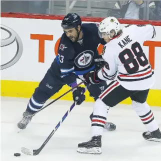  ?? BRIAN DONOGH/WINNIPEG SUN ?? Winnipeg Jets defenceman Dustin Byfuglien is not a big fan of the new 3-on-3 overtime, calling it a terrible part of hockey. But it’s helping to reduce shootouts and fans have embraced it.