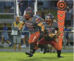  ?? MORNING CALL ?? Trey Tremba leads the way for teammate Luke Spang during last week’s game against Nazareth. Tremba scored four touchdowns in the 31-24 Parkland win.