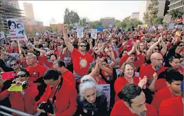  ?? Luis Sinco
Los Angeles Times ?? MEMBERS of United Teachers Los Angeles press contract demands at a rally in Grand Park. Unions say that targeting instructor­s weakens labor’s ability to counteract proposals they believe undermine public education.