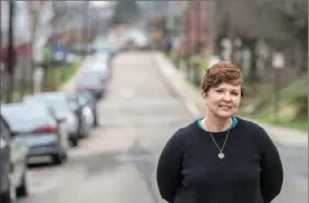  ??  ?? Amy Kline, of Dormont, organized the Facebook event in which neighbors in her community sang outside their homes every Sunday evening during the COVID-19 lockdown.