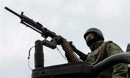  ??  ?? A member of Mexico’s national guard patrols the Sonora mountain range, where nine members of the Mormon community were killed. Photograph: Hérika Martínez/AFP via Getty Images