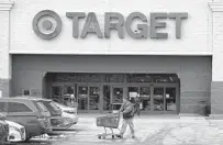  ?? CHARLES KRUPA AP ?? Target issued a cautious outlook for the year amid inflation.