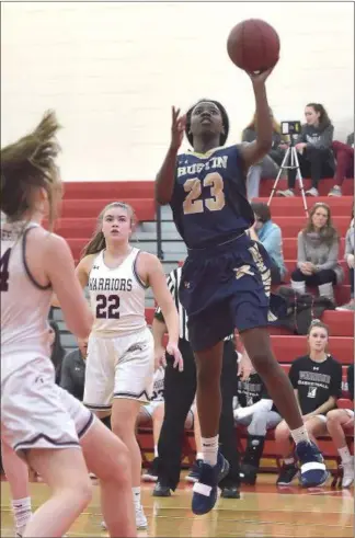  ?? PETE BANNAN — MEDIANEWS GROUP ?? West Chester Rustin’s Dakiya Daniels shoots in the first quarter against West Chester Henderson Saturday.