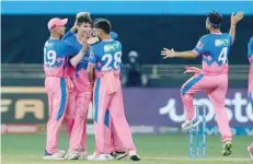  ?? — BCCI ?? Kartik Tyagi of Rajasthan Royals celebrates a wicket with teammates.