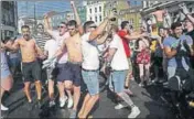  ??  ?? Fans poured on to the streets in England to celebrate their team’s passage to the semifinals. AFP PHOTO